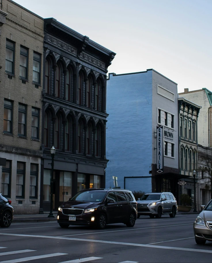 Cars on a city road.