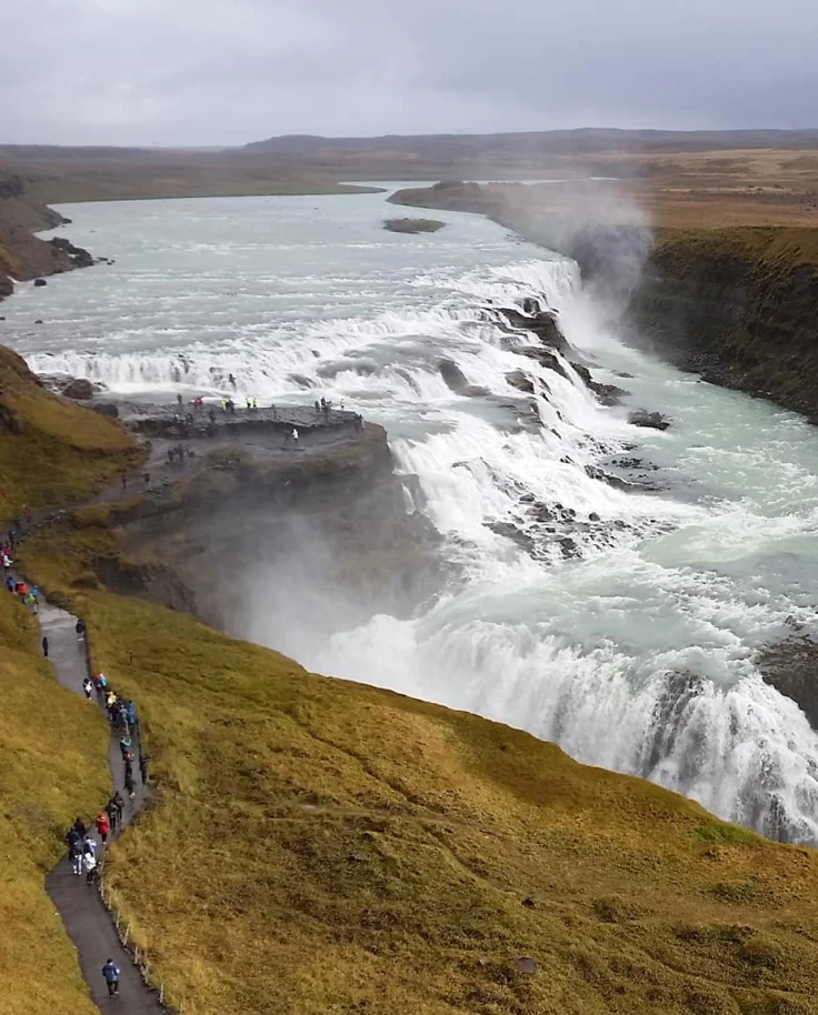 An aerial view of a large waterfall