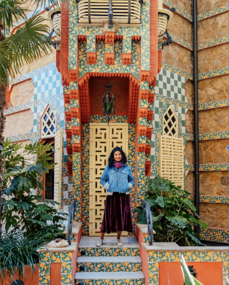Gaya Vinay standing on colorful steps