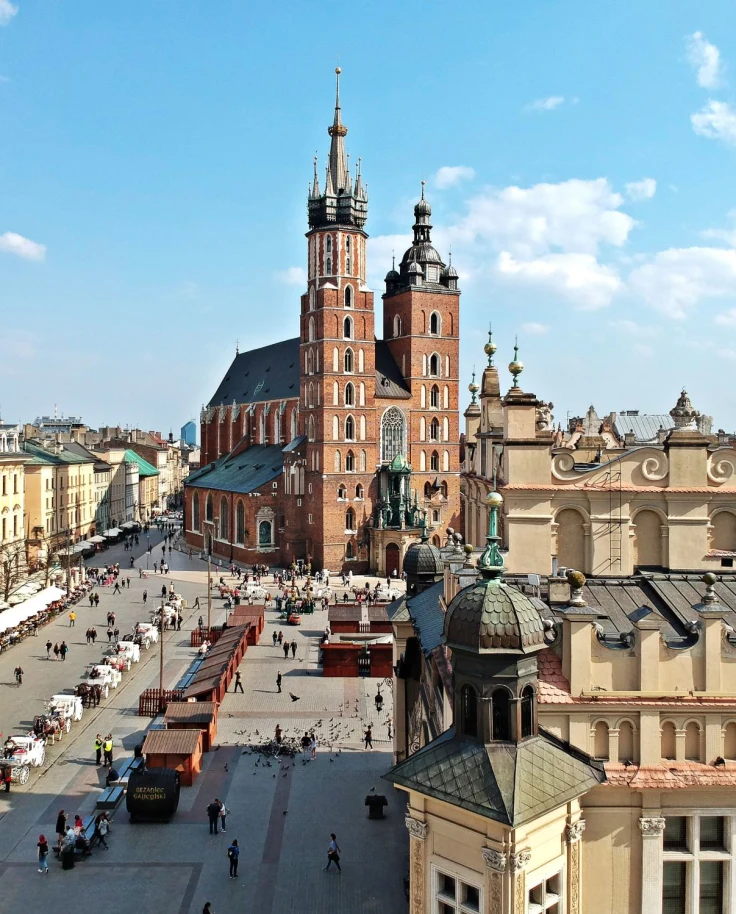 main market square in a old city with vendor tens lining the street