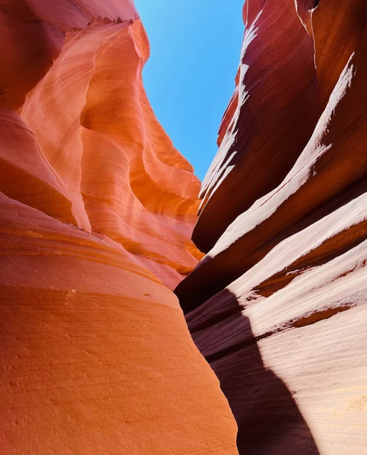 Rock formation under blue sky.