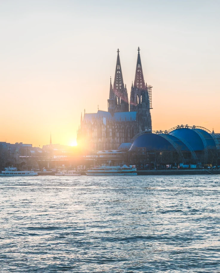 view of a historic city from a river