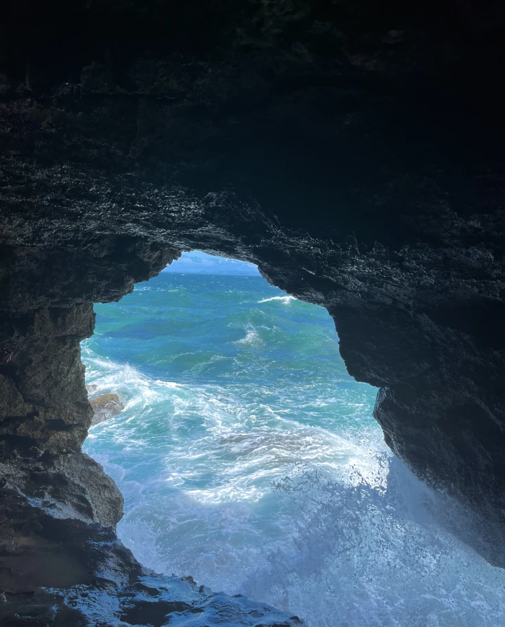 A rocky cove with water flowing in
