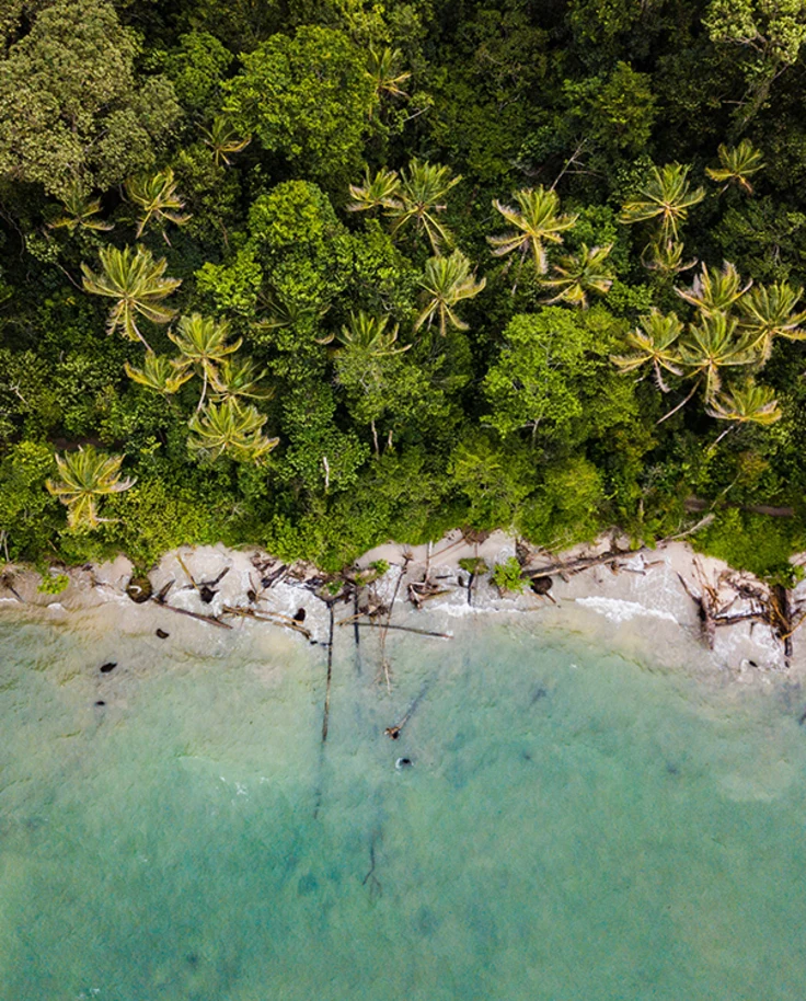 Aerial view of Las Catalinas Costa Rica with Blue Water and Green palm Trees