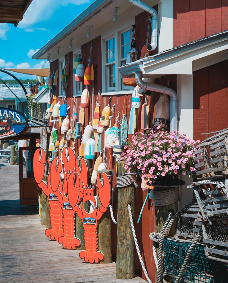 lobster shack with buoys hanging on the exterior