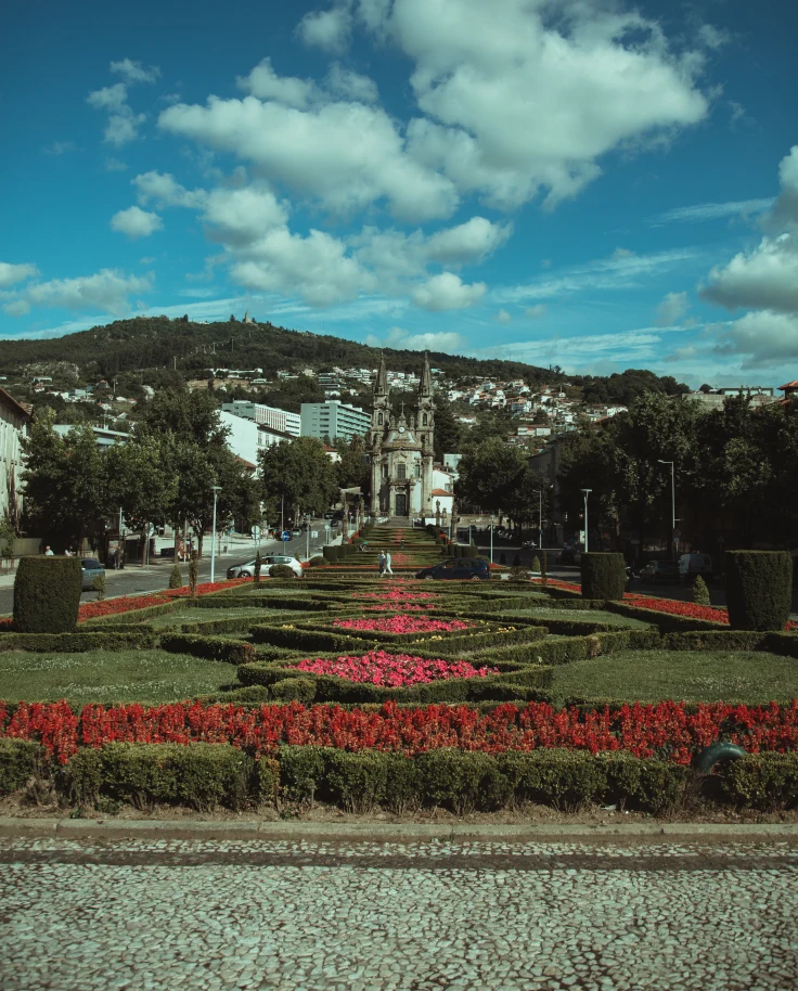 large garden with a building in the background