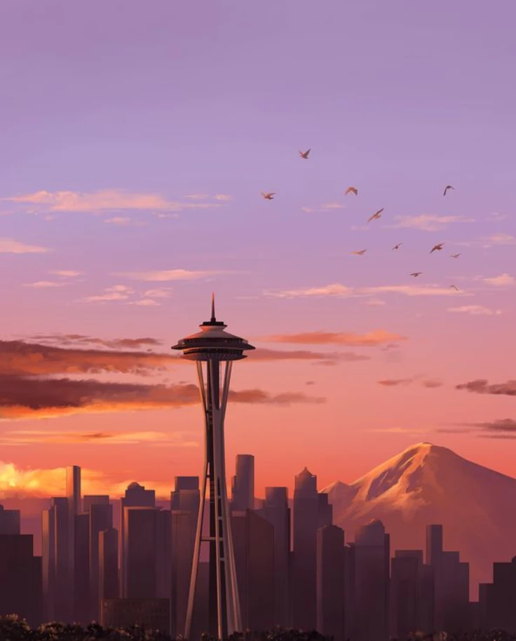 An aesthetic view of a tower in Seattle during sunset