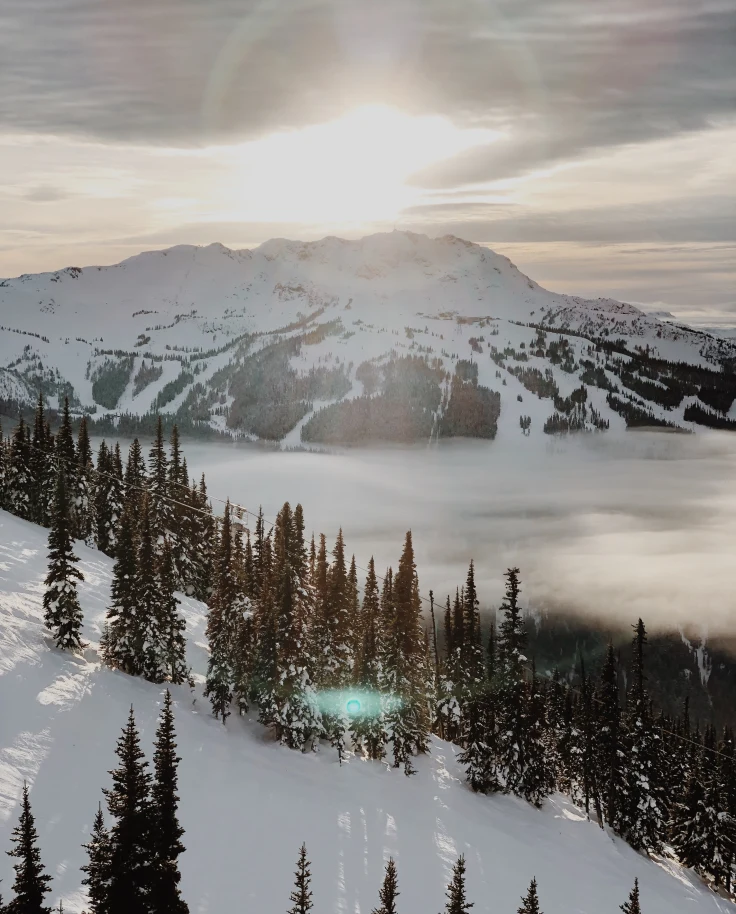 white snow-capped mountains during sunrise