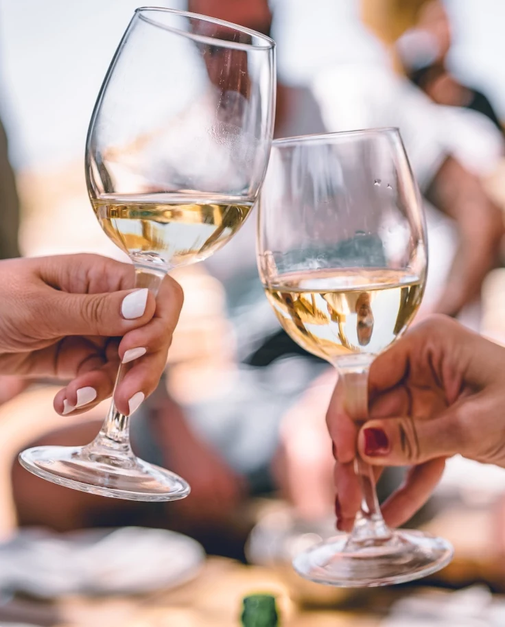 Holding glass of champagnes.