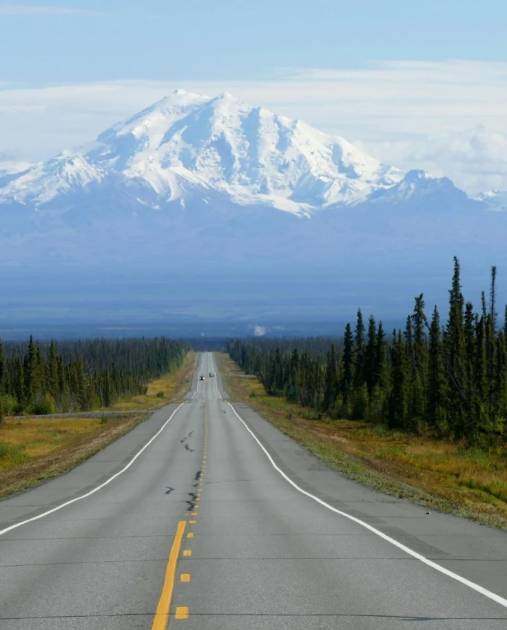 Road towards snow covered mountains