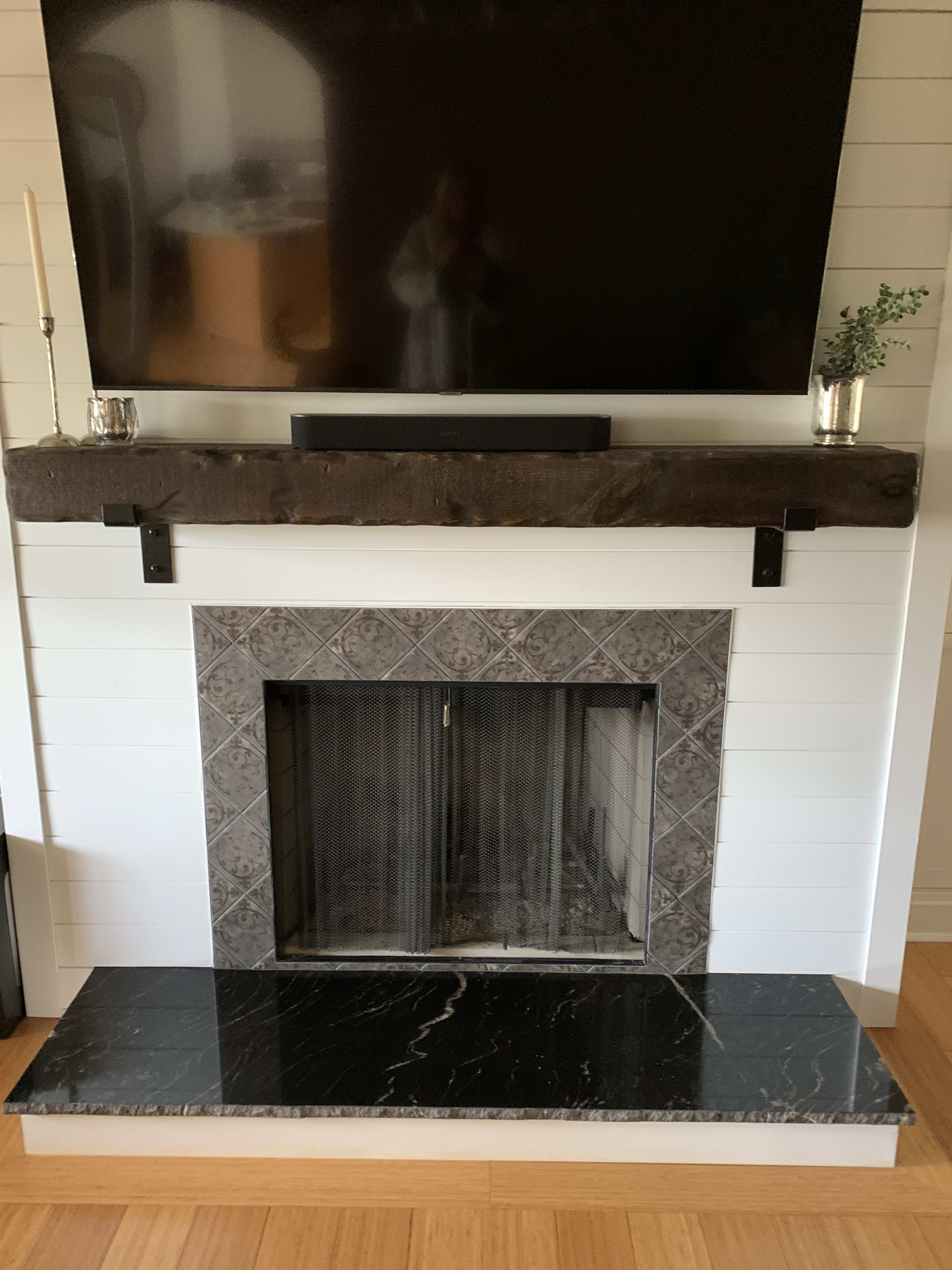 Stone and shiplap fireplace surround in Duncan, SC from In Line Tile of Greer