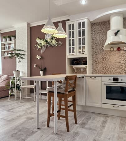 waterproof vinyl flooring installed under breakfast bar by Kanter's Carpet and Home