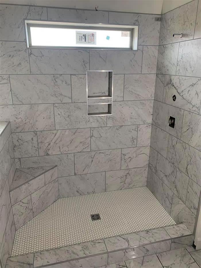 Beautiful bathroom tile by Sandoval Flooring LLC in Eutaw, AL