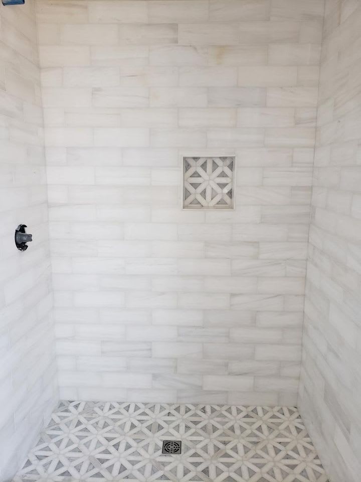 Beautiful bathroom tile by Sandoval Flooring LLC in Vance, AL