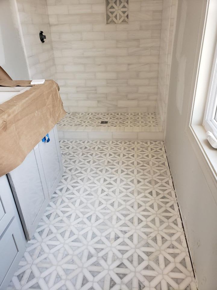 Beautiful bathroom tile by Sandoval Flooring LLC in Reform, AL