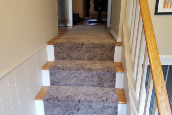 Staircase runner installed by Modular Flooring Solutions in Manchester, NH