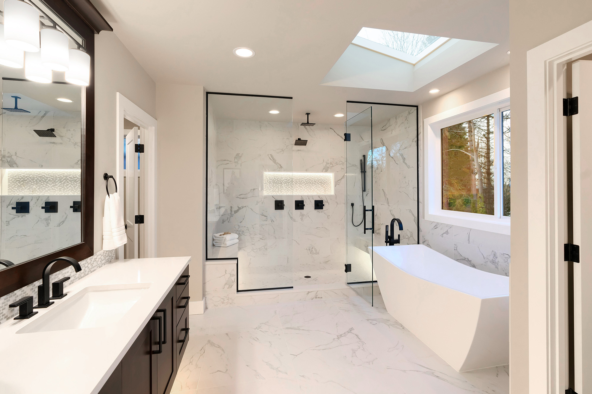 Ceramic Tile in a large luxury bathroom for all seasons in a Western NY Climate by Custom Carpets