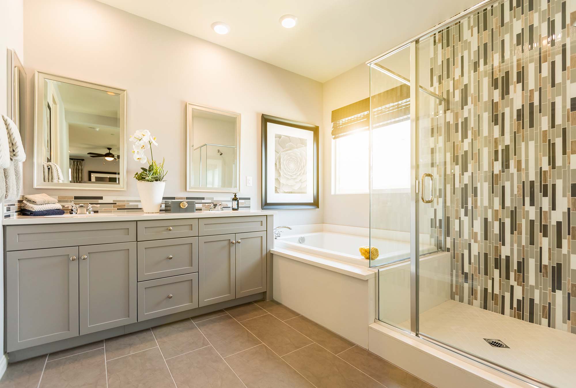 Tile floors and shower in a luxury bathroom by Hadingers in Fort Myers Florida