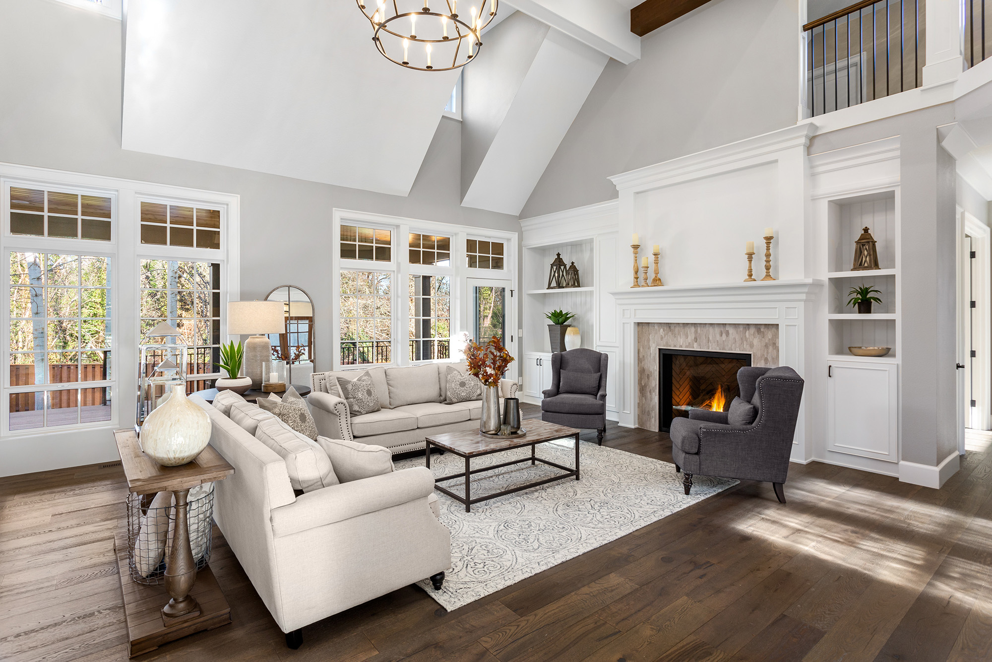 Spacious living room with elegant hardwood flooring by AJ Rose in Burlington, Lynnfield, Natick, and Needham, MA.