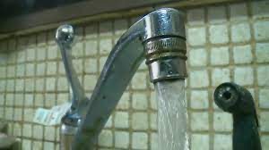 A faucet with water running out of it