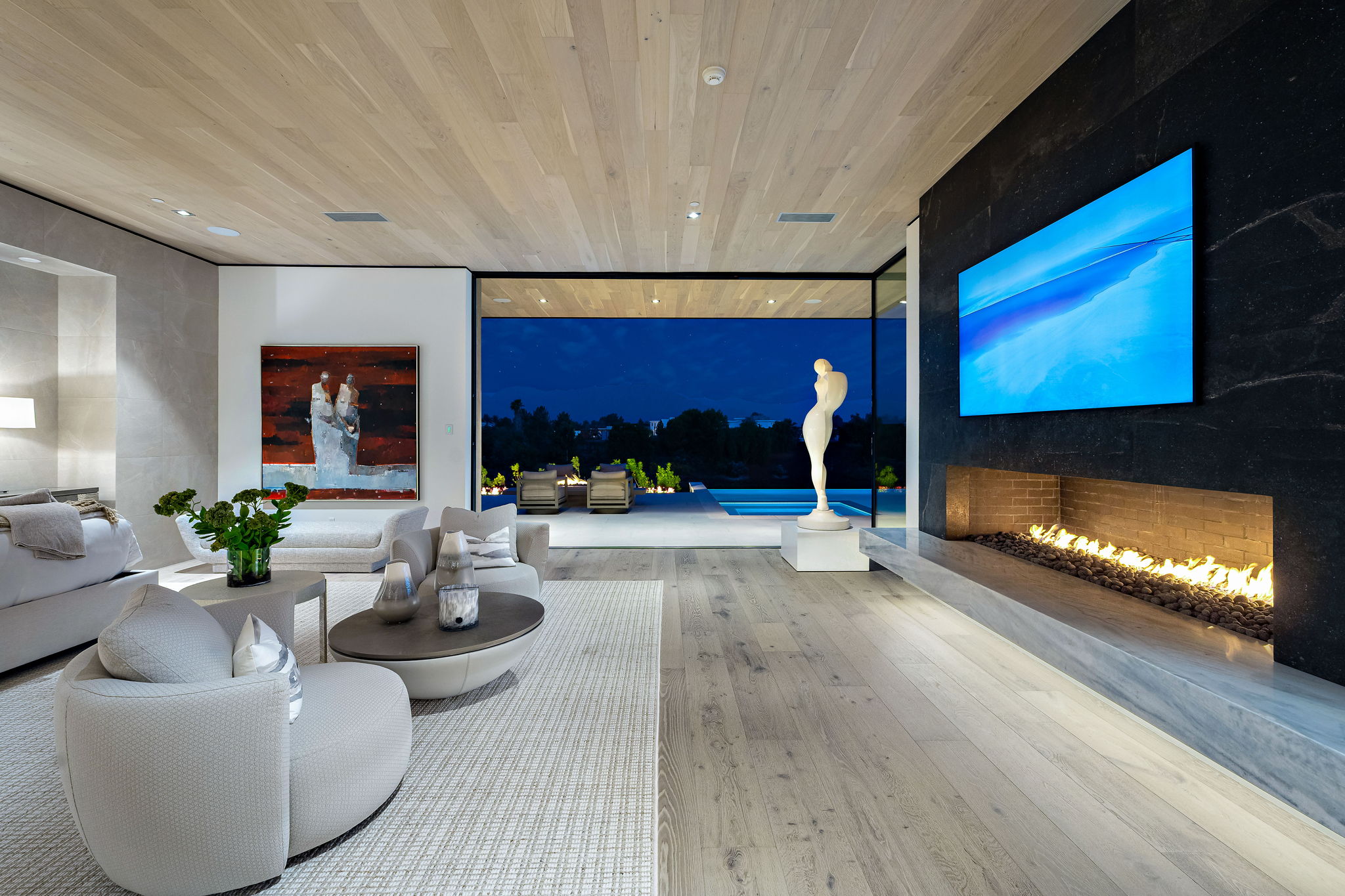 Luxury laminate flooring in a open space large living room and fire place by Flooring 101 in Oxnard, CA - Ventura, CA - Bakersfield, CA - Goleta, CA - Thousand Oaks, CA - Santa Maria, CA - Simi Valley, CA