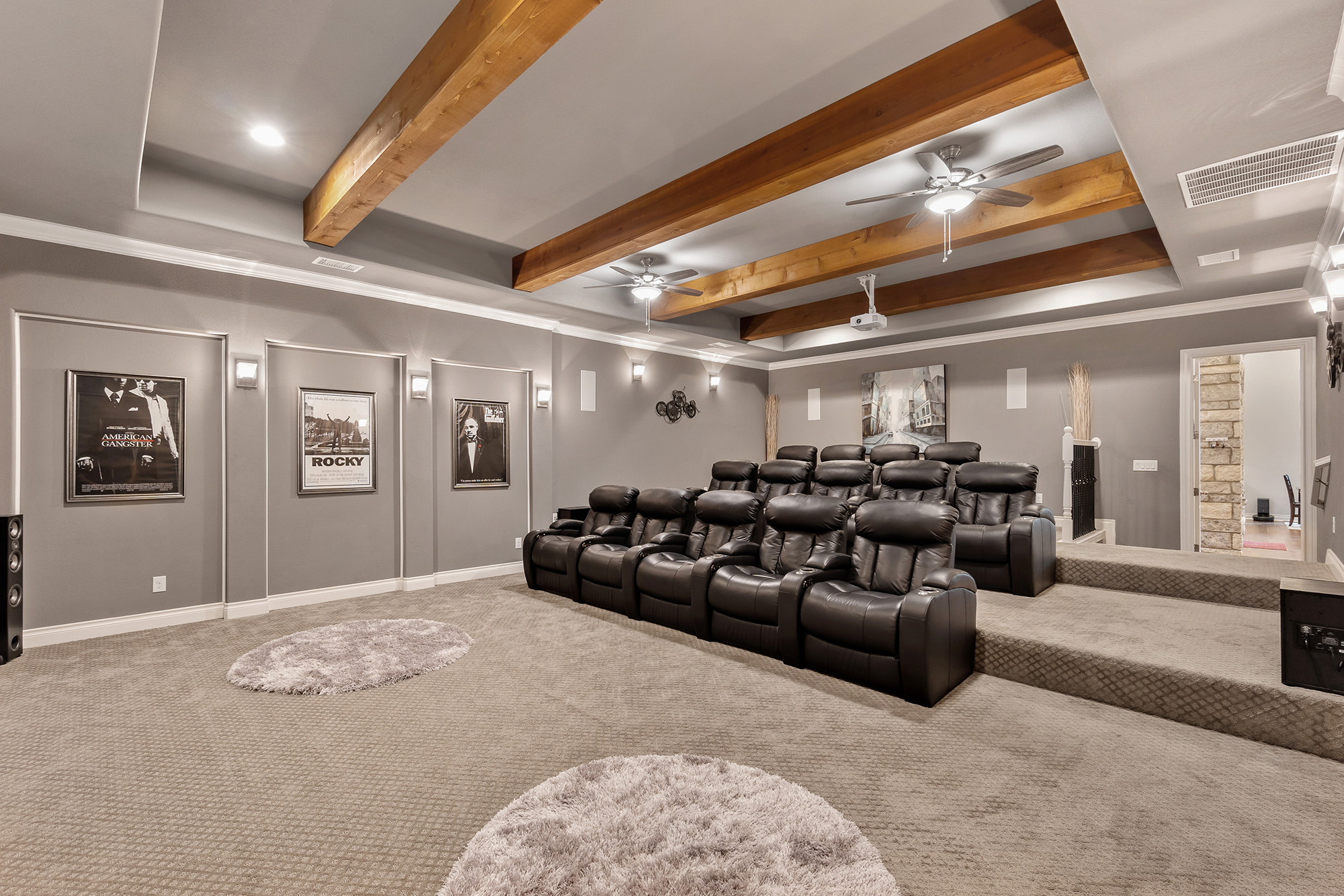 Carpet flooring in a mini living theater room by Sterling Flooring in Anaheim, CA & Mission Viejo, CA.