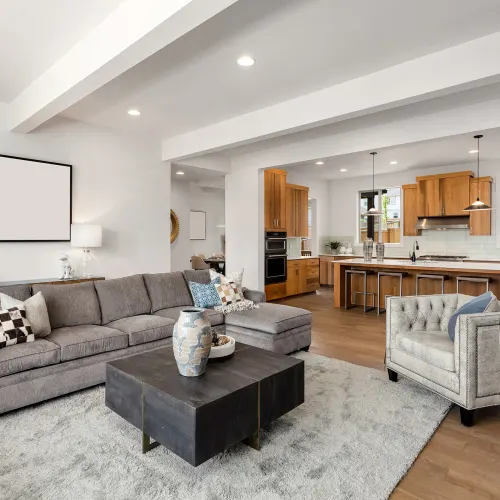 Grey area rug in the living setting by Sterling Flooring in Anaheim, CA & Mission Viejo, CA.