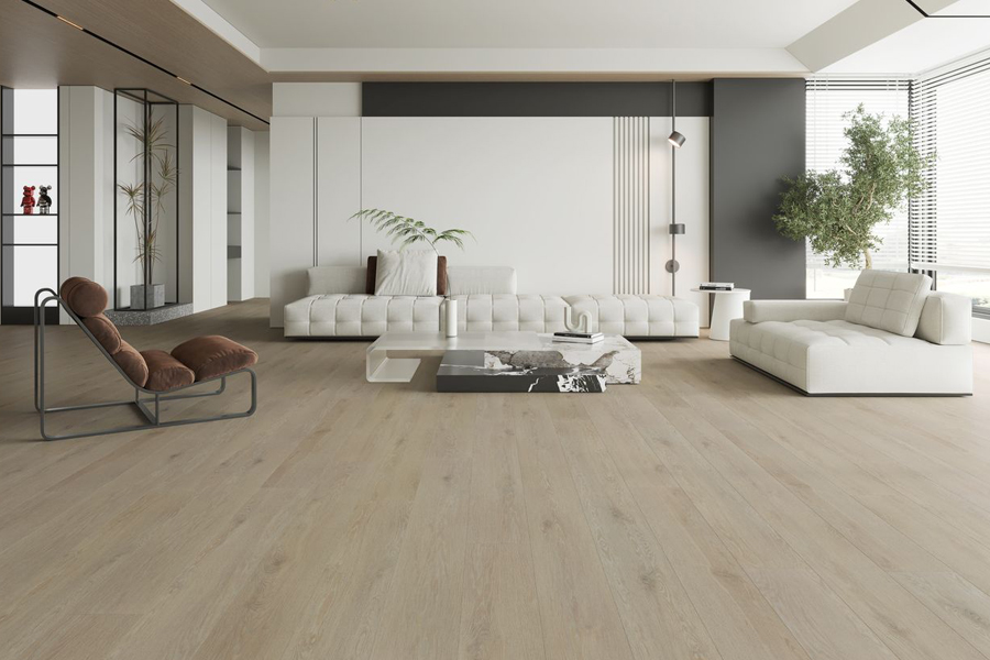 Spacious modern living room featuring light wide plank laminate flooring by Sterling Carpet & Floorings in Anaheim, CA & Mission Viejo, CA.