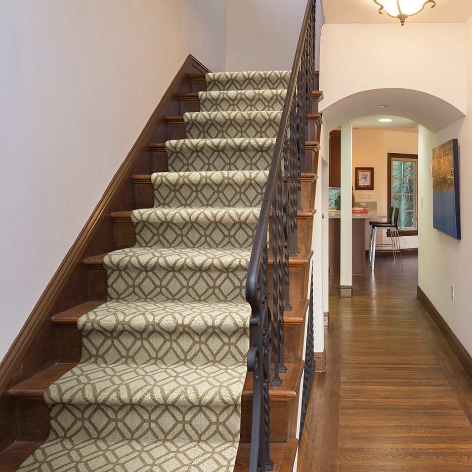 Stair runner rug design on a large staircase in the home leading to the second floor by AJ Rose in Needham, MA - Lynnfield, MA - Natick, MA - Burlington, MA. 