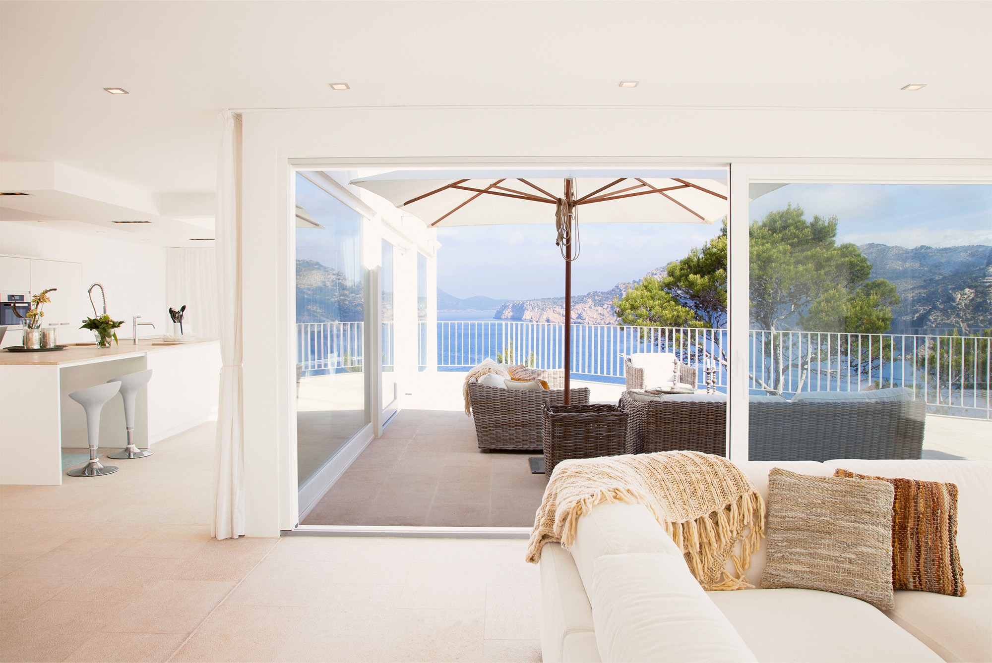 Large tile flooring in the living and kitchen area by Flooring 101 in Oxnard, CA - Ventura, CA - Bakersfield, CA - Goleta, CA - Thousand Oaks, CA - Santa Maria, CA - Simi Valley, CA.