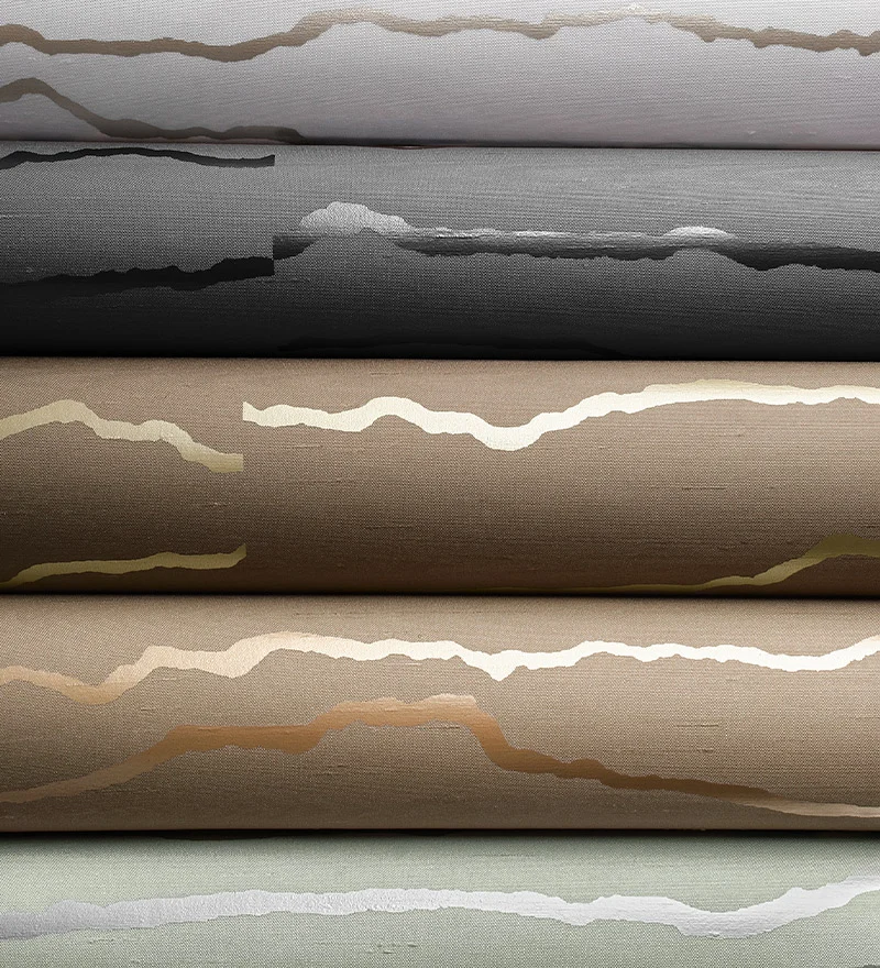 Luxury textured wallcovering rolls in neutral tones