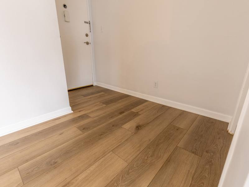 Brookside KC Luxury Vinyl Plank Installation | Mid-Century Condo - Big Bob’s Flooring Outlet