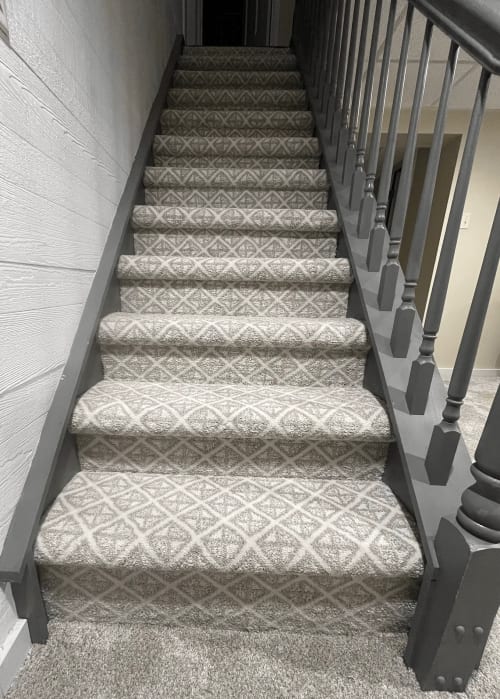 Beautiful carpeted stairs in North Versailles, PA from Kacey's Carpet & Tile