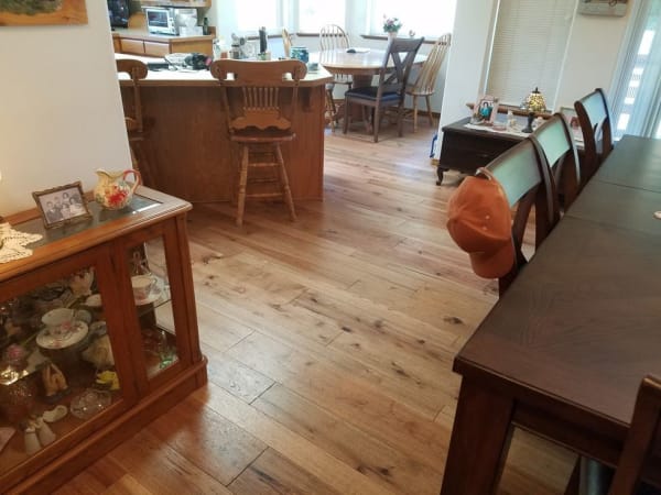 Elevate your interior with stunning hardwood flooring from Ron's Hardwood Floors.