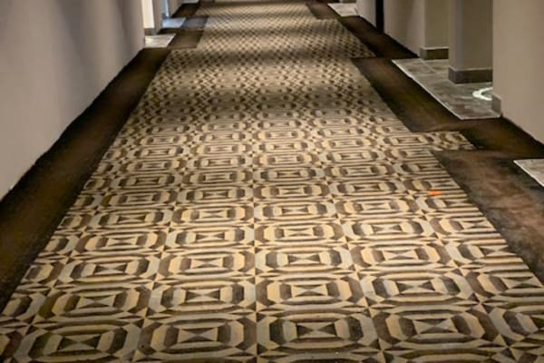 Custom hallway carpet installation in Caledonia, WI by DE Floor Coverings Inc