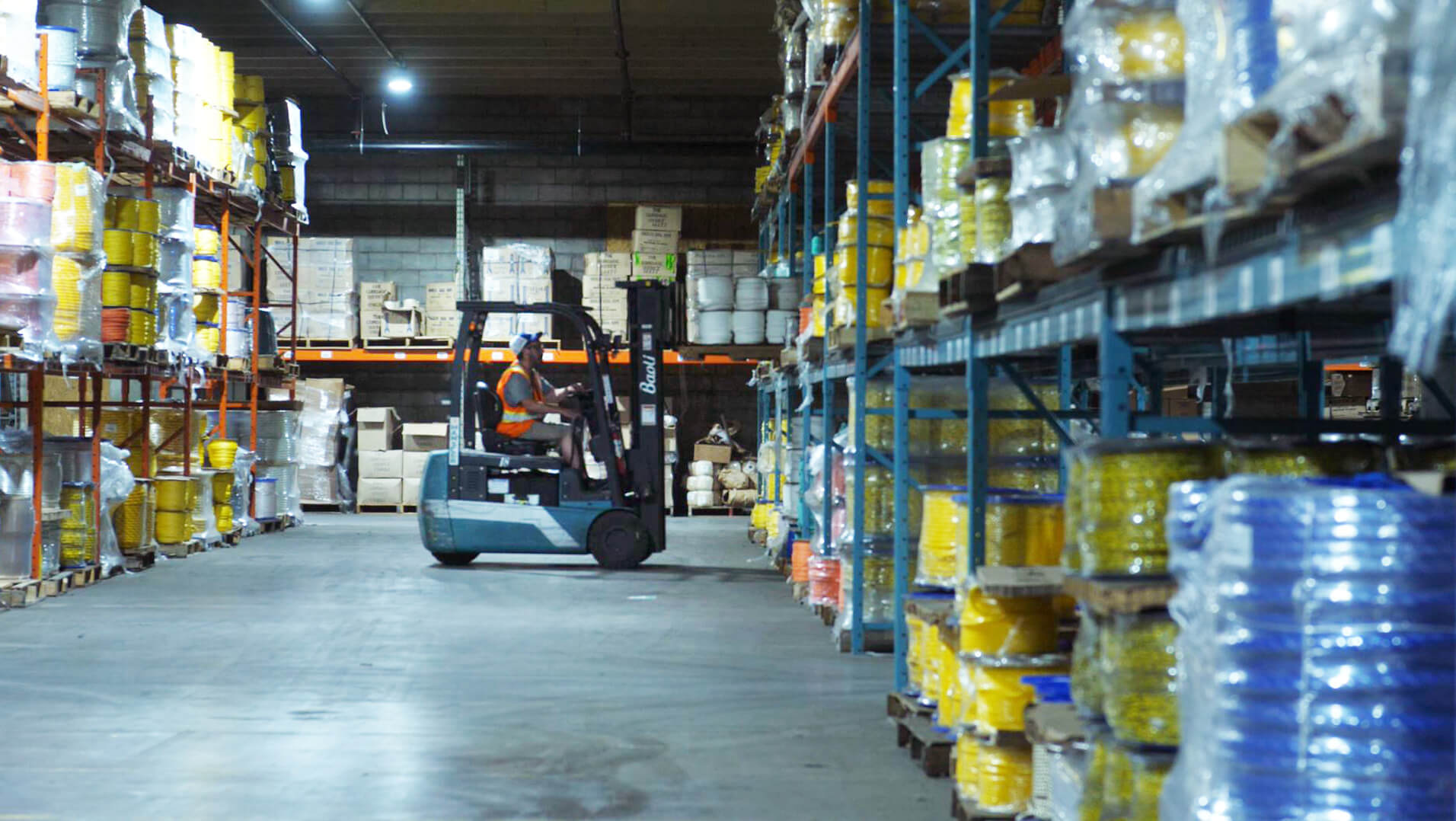 Forklift working in the Orion Cordage warehouse Forklift working in the Orion Cordage warehouse
