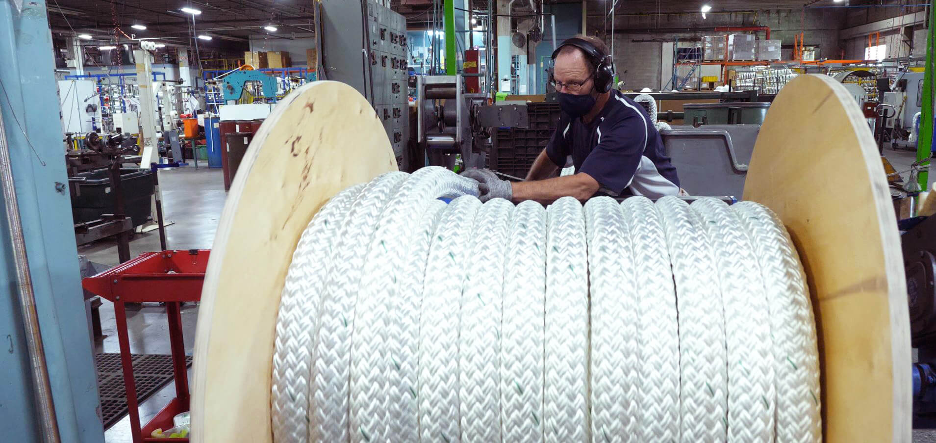 Spooling rope in the Orion Cordage warehouse Spooling rope in the Orion Cordage warehouse