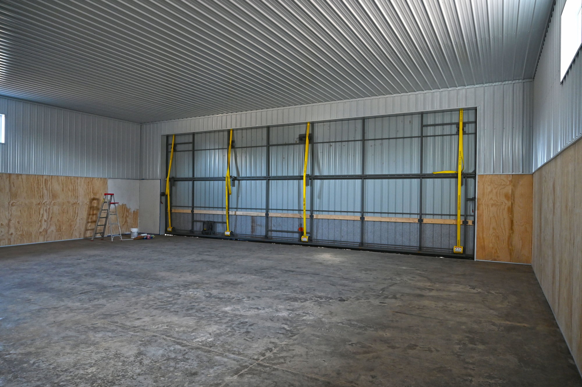 Manure processing equipment inside custom agricultural building