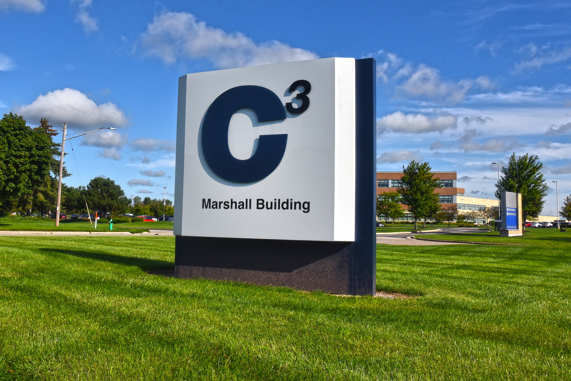 C3 Marshall Building sign with building in the background