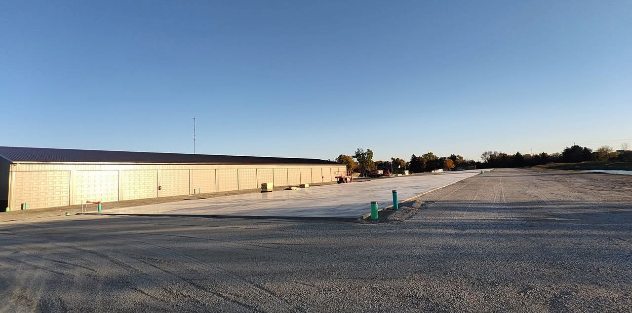 Concrete slab poured for new storage building construction