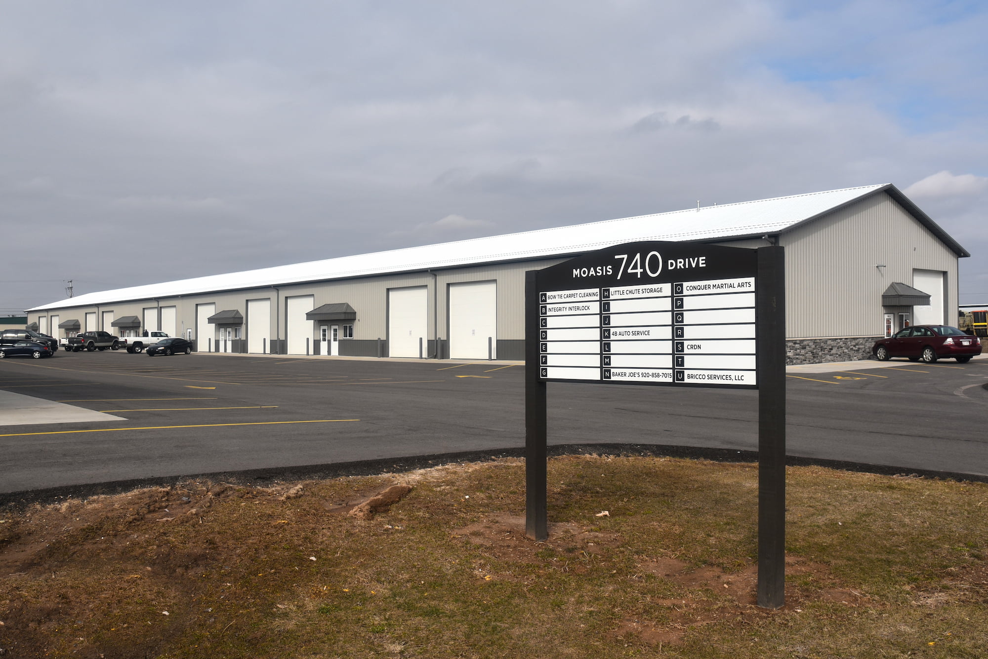 Tenant signage with Little Chute Storage Center in the background