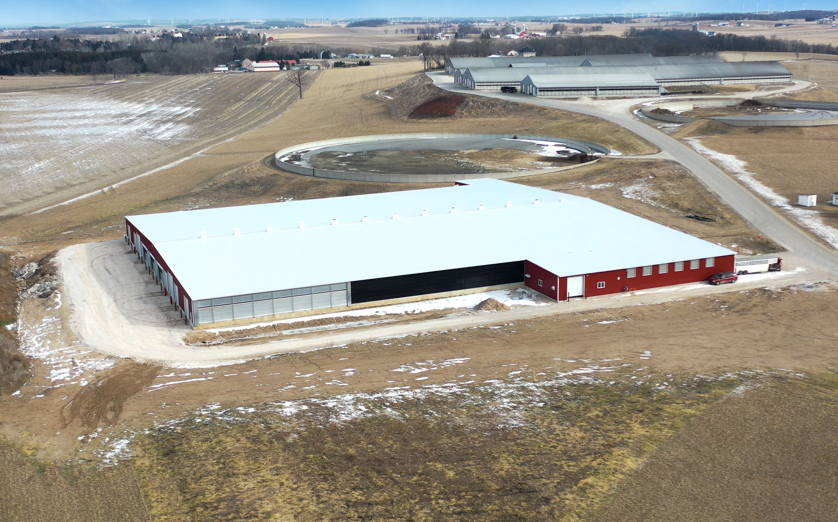 Redtail Ridge Dairy addition featuring multiple freestall barns, shop with wash bay, milking parlor, and vac/electrical room