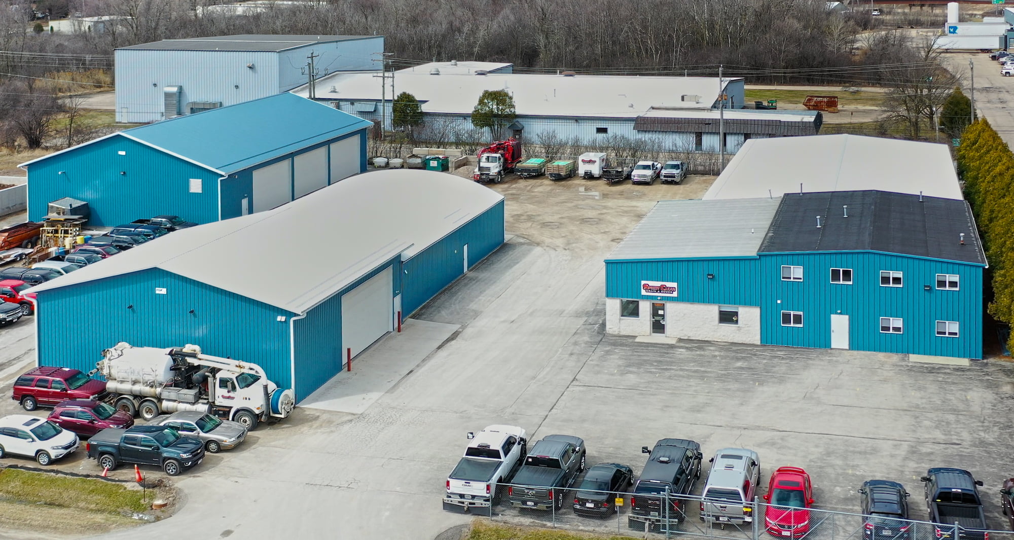 Drone view of Speedy Clean and their three buildings after their remodel and additions