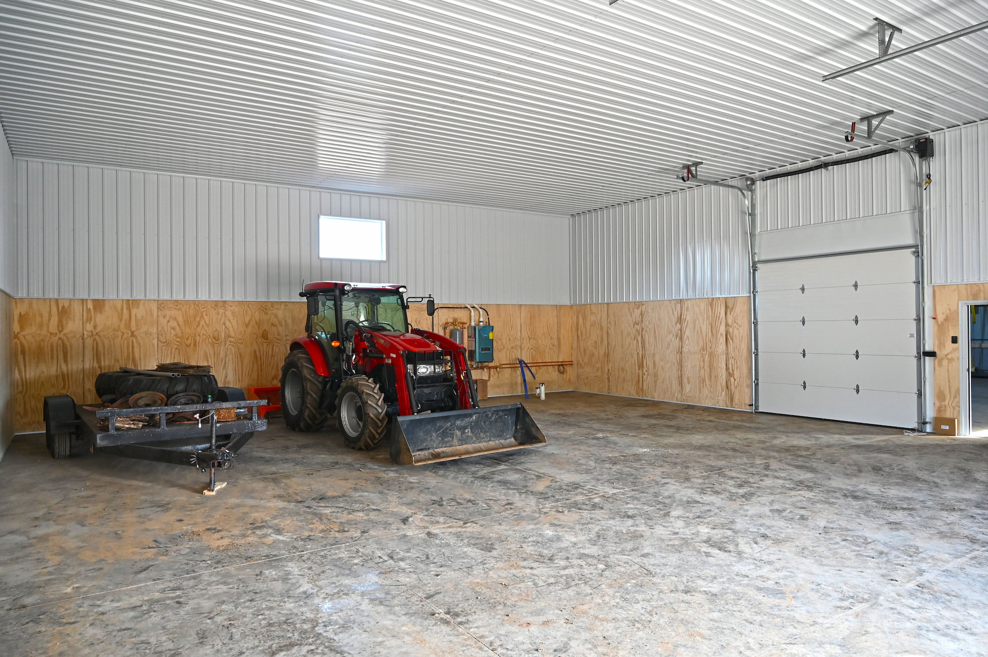 Manure processing equipment inside custom agricultural building