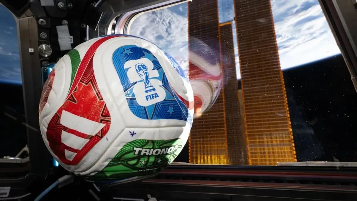 Jared Isaacman holding a soccer ball