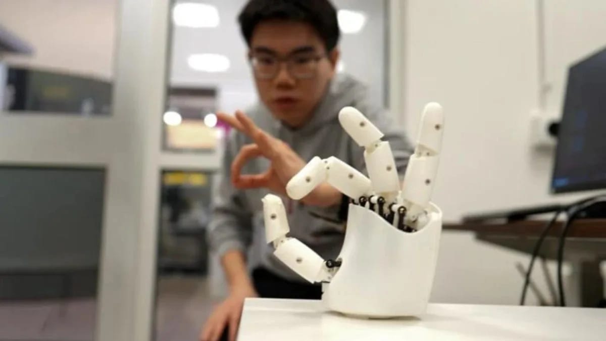 Internal mechanics of 1X Neo robot hand showing tendon-driven actuation