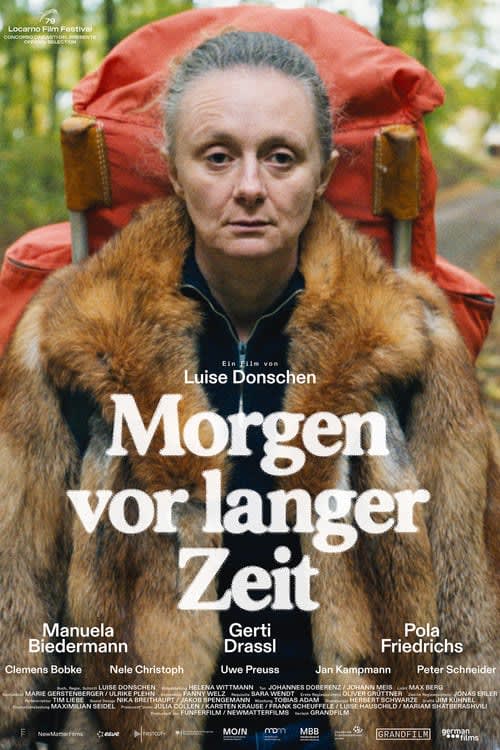 Movie poster for Tomorrow a Long Time Ago (2026) featuring a silhouette of a woman in a dense, misty forest with the title text overlaid.