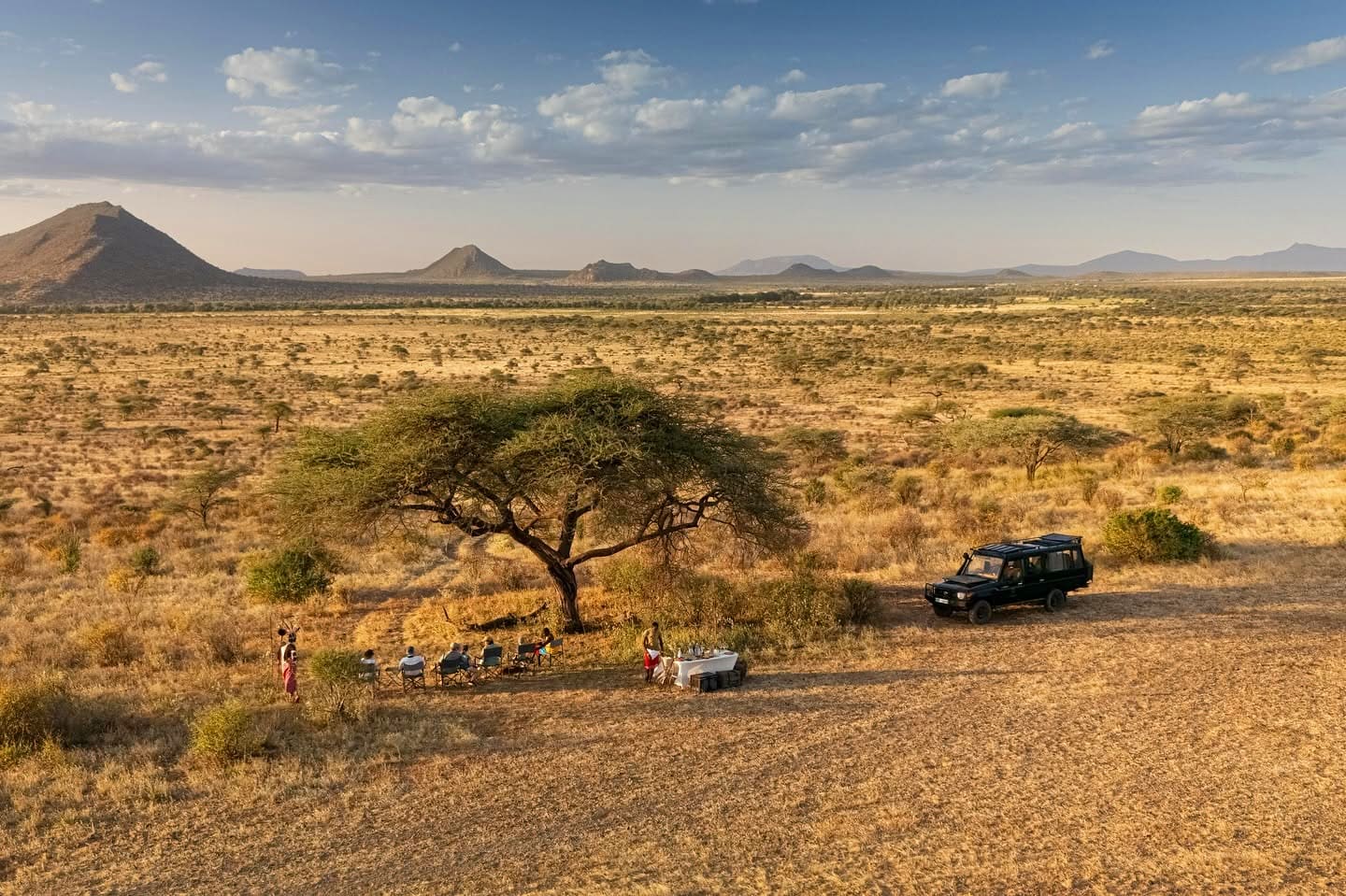 A private bush breakfast set under an acacia on the northern plains