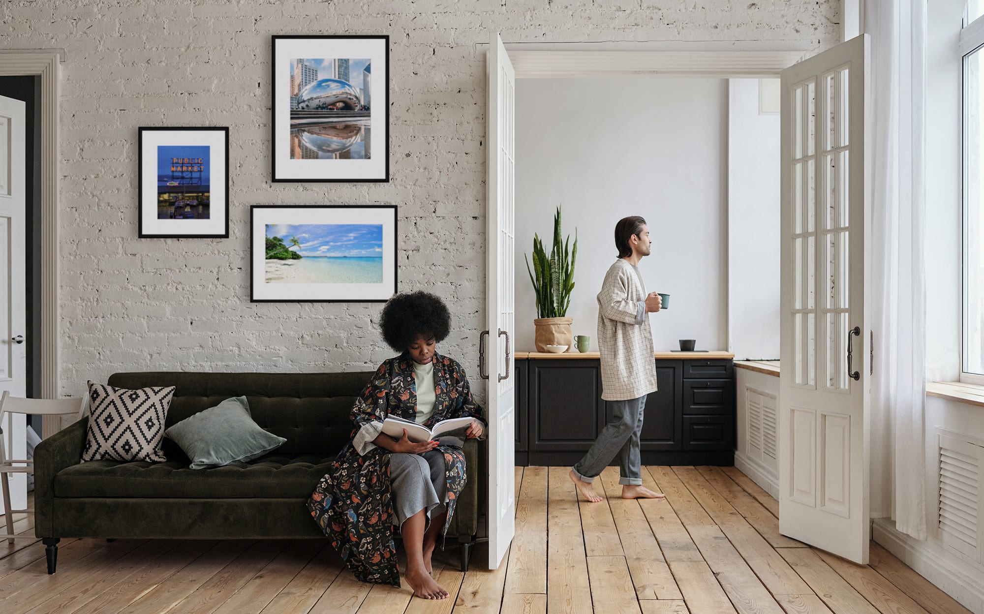 Black frames on brick wall