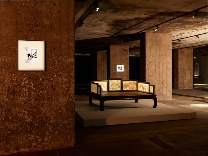 Photo of a piece of furniture and a framed contemporary photograph in the Feuerle Collection. Photo by Nic Tenwiggenhorn.
